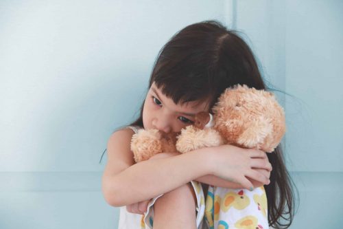 Child and Stuffed Animal